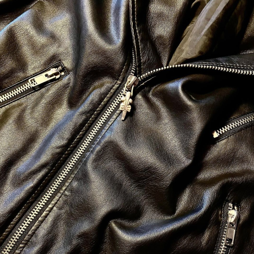 SophistiGance jewelry on a leather jacket zipper